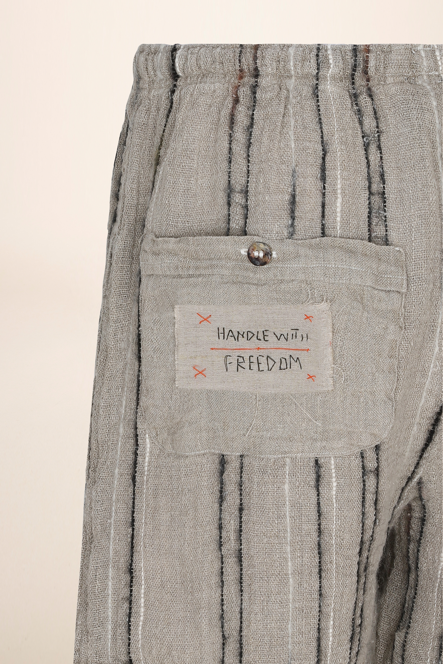 MAREMOTO STRIPED TROUSERS